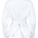 White blouse with a knot detail at the back on a white background